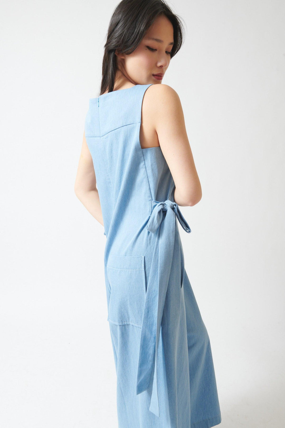 Lilly wearing Meimeij Side Tie Wide Leg Overalls With Pockets side/view view