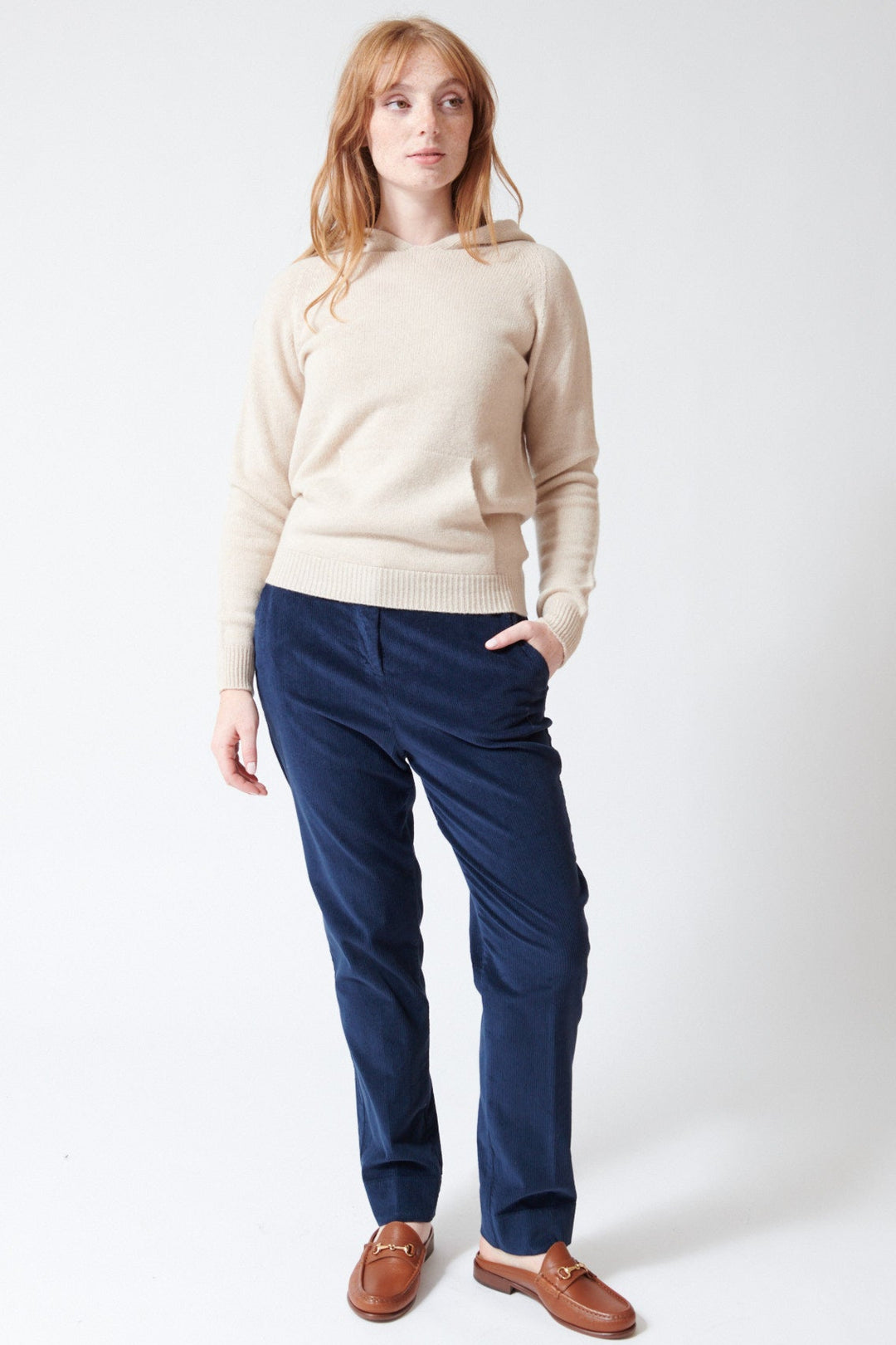 Waverly wearing Rosso 35 Stretch Back Corduroy Pant in Blue, front view.