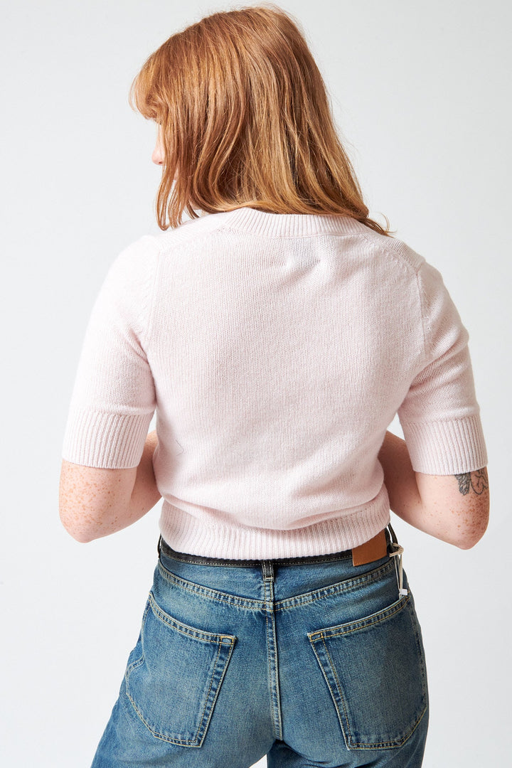 Waverly wearing Allude Cashmere Half Sleeve V Cardigan rear view