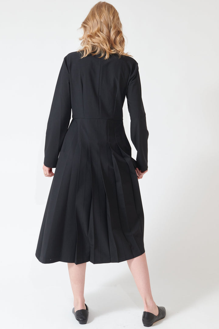 Maddie wearing Meimeij Half Blazer Pleat Dress rear view