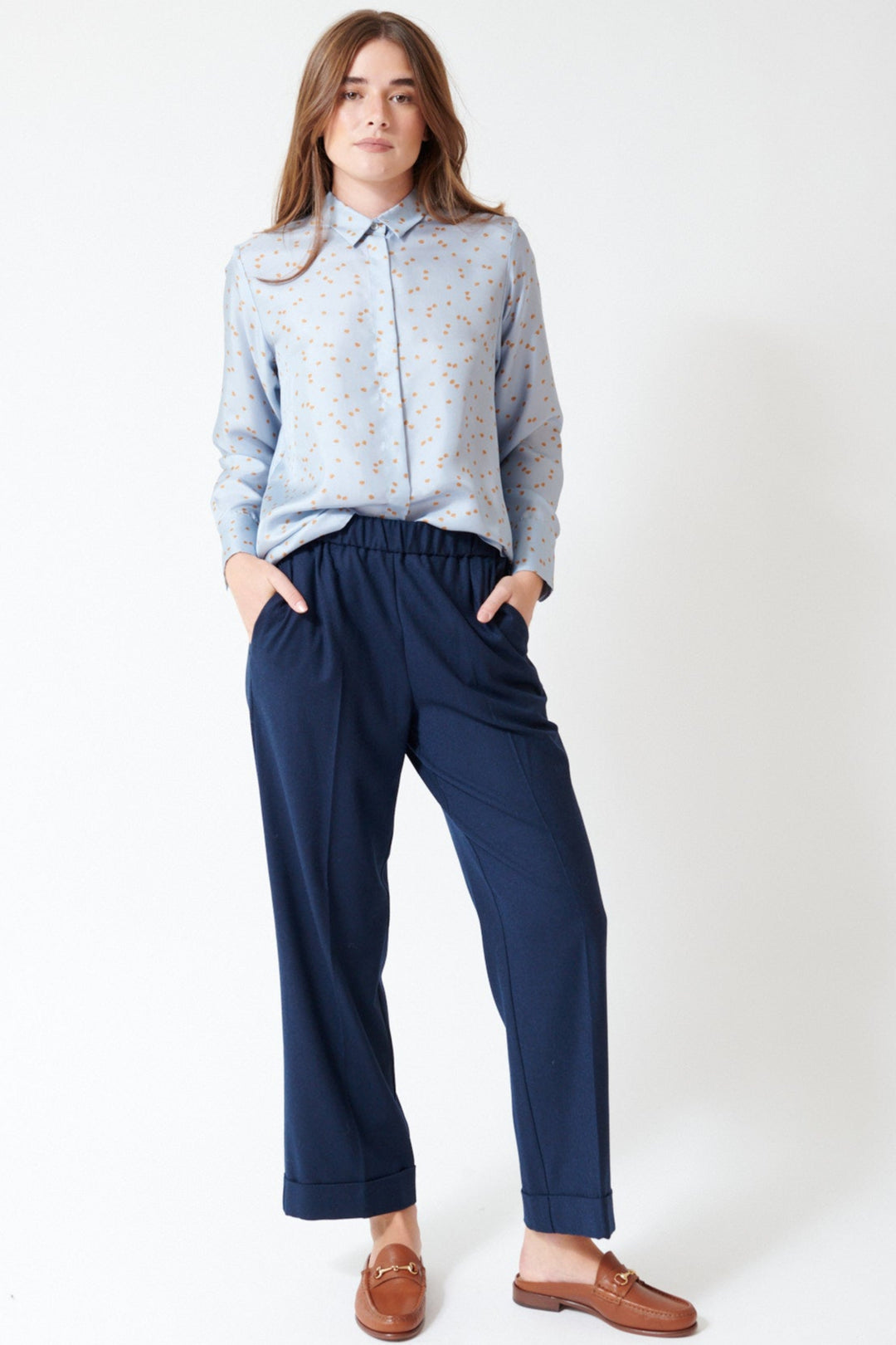 Julia wearing Rosso 35 Cuffed Wool Blend Stretch 35 Pant in Blue, front view.