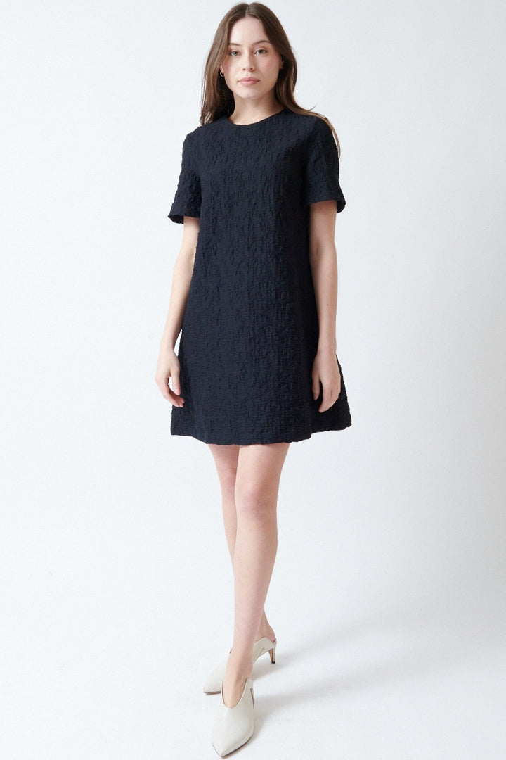 Angela wearing Harris Wharf Short Sleeve Crinkle Bell Dress front view