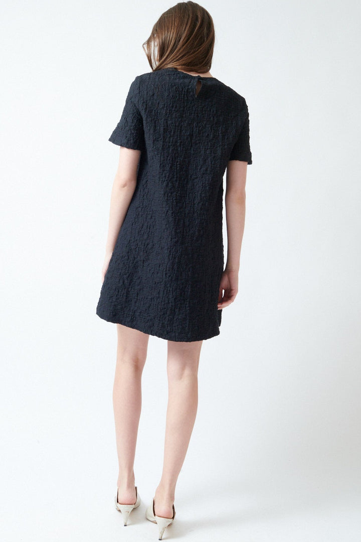 Angela wearing Harris Wharf Short Sleeve Crinkle Bell Dress rear view