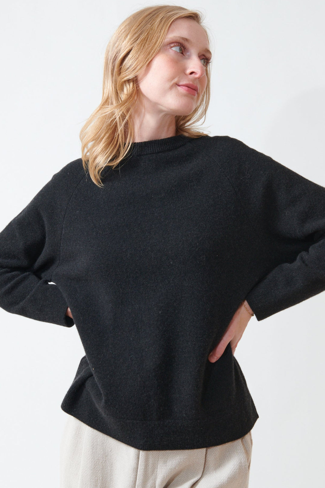 Madi wearing Evam Eva Press Wool Raglan Pullover front view