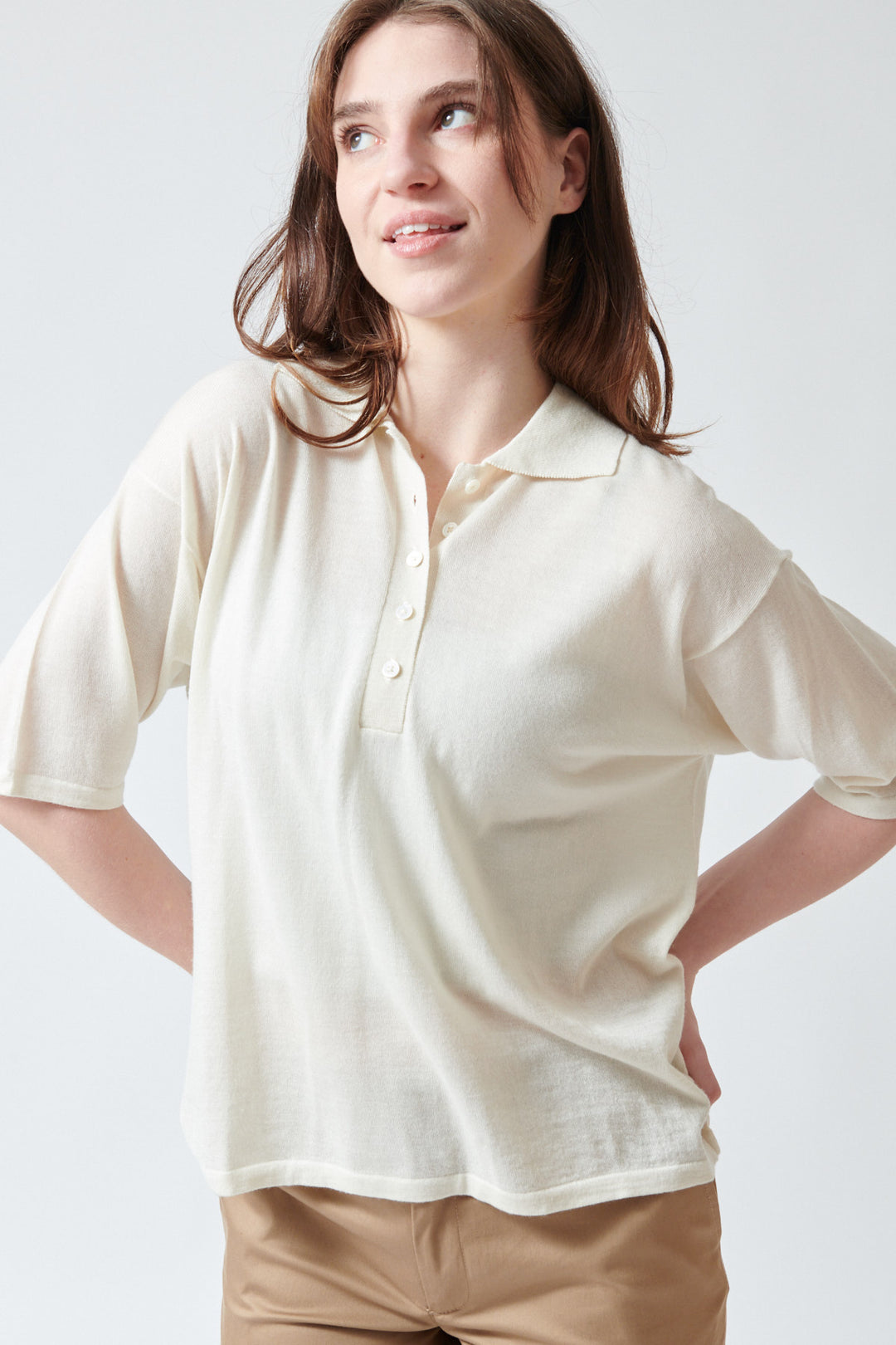 Sophie wearing SPRWMN Short Sleeve Oversized Polo front view