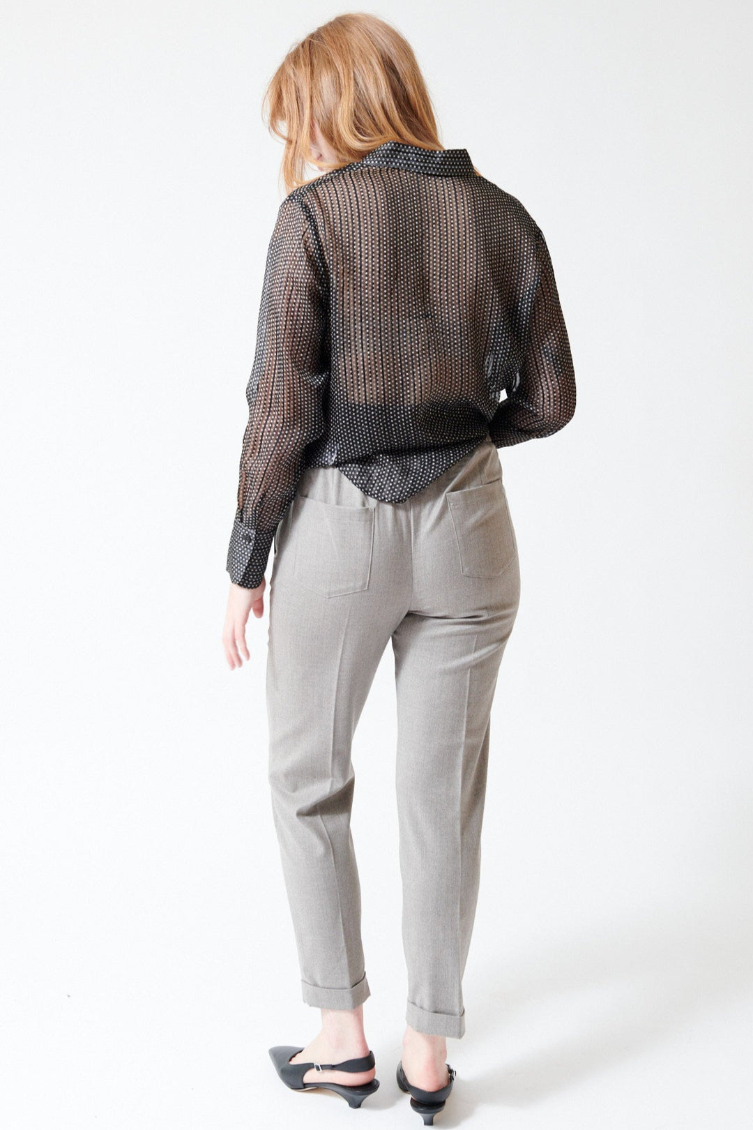 Waverly wearing Rosso 35 Cuffed Stretch Back Pant in Mushroom Melange, rear view.