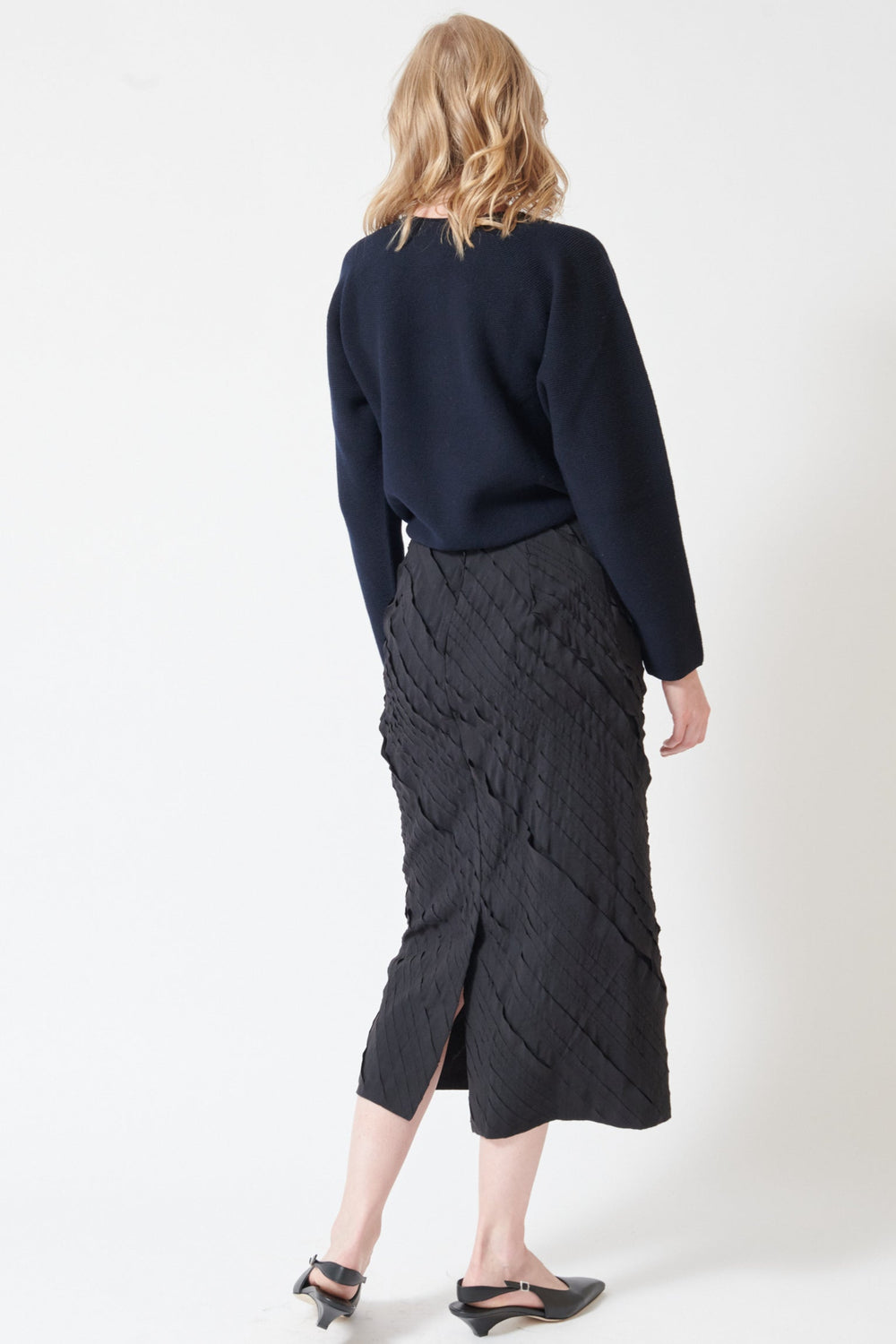 Madi wearing Christian Wijnants Simbi Skirt rear view