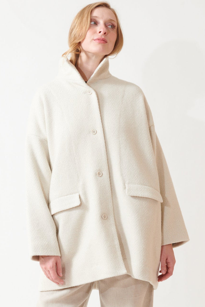 Madi wearing Evam Eva Renew Wool Stand Short Coat front view