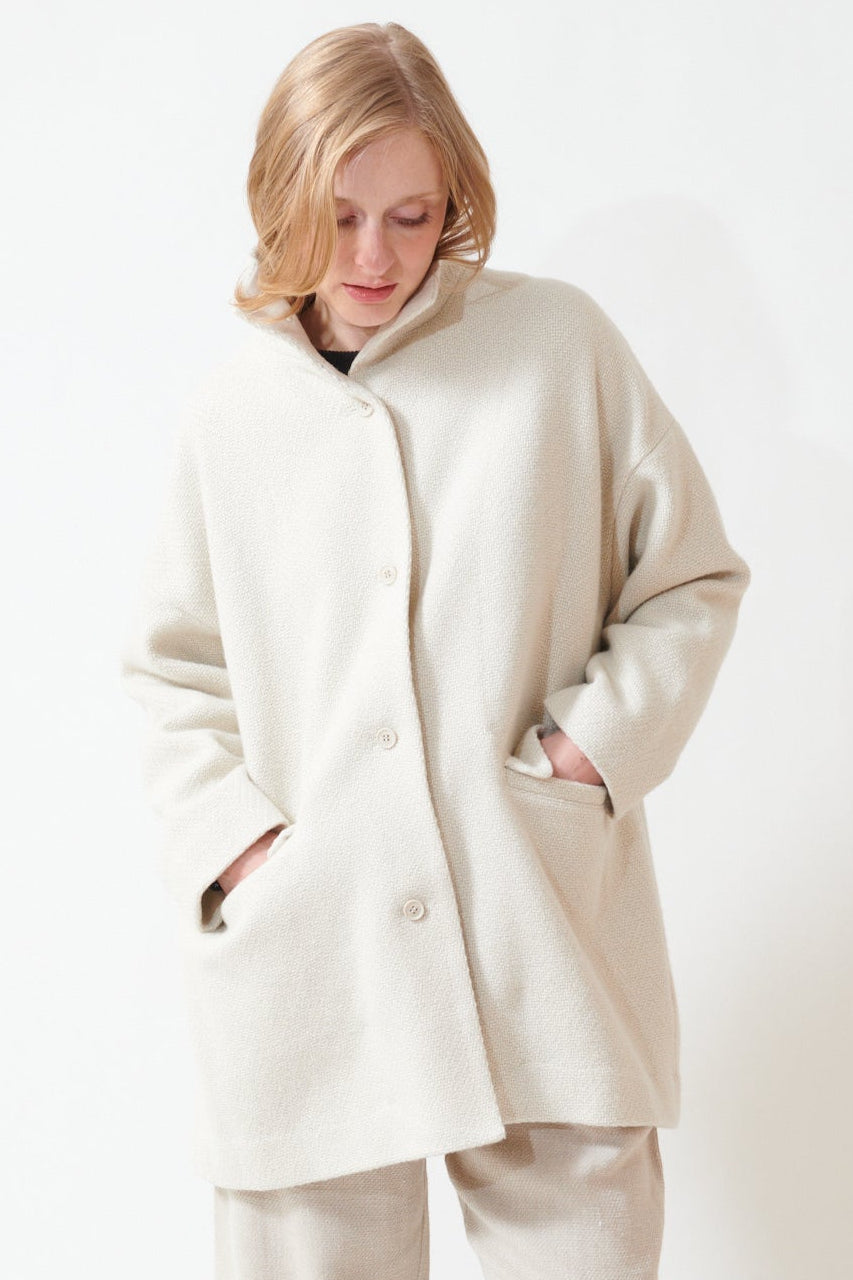 Madi wearing Evam Eva Renew Wool Stand Short Coat front view