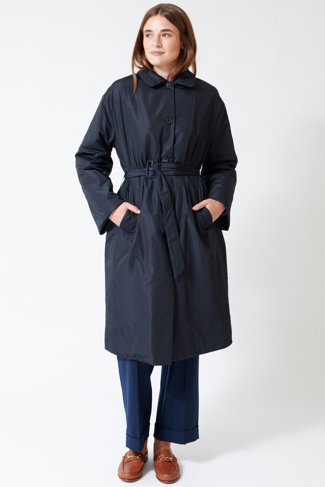 Julia wearing Rosso 35 Thermore Insulated Trench Coat in Deep Blue, front view.