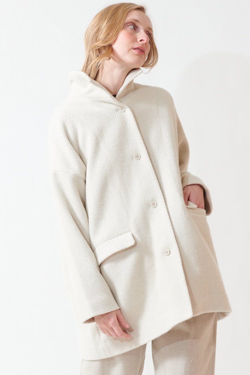 Madi wearing Evam Eva Renew Wool Stand Short Coat front view