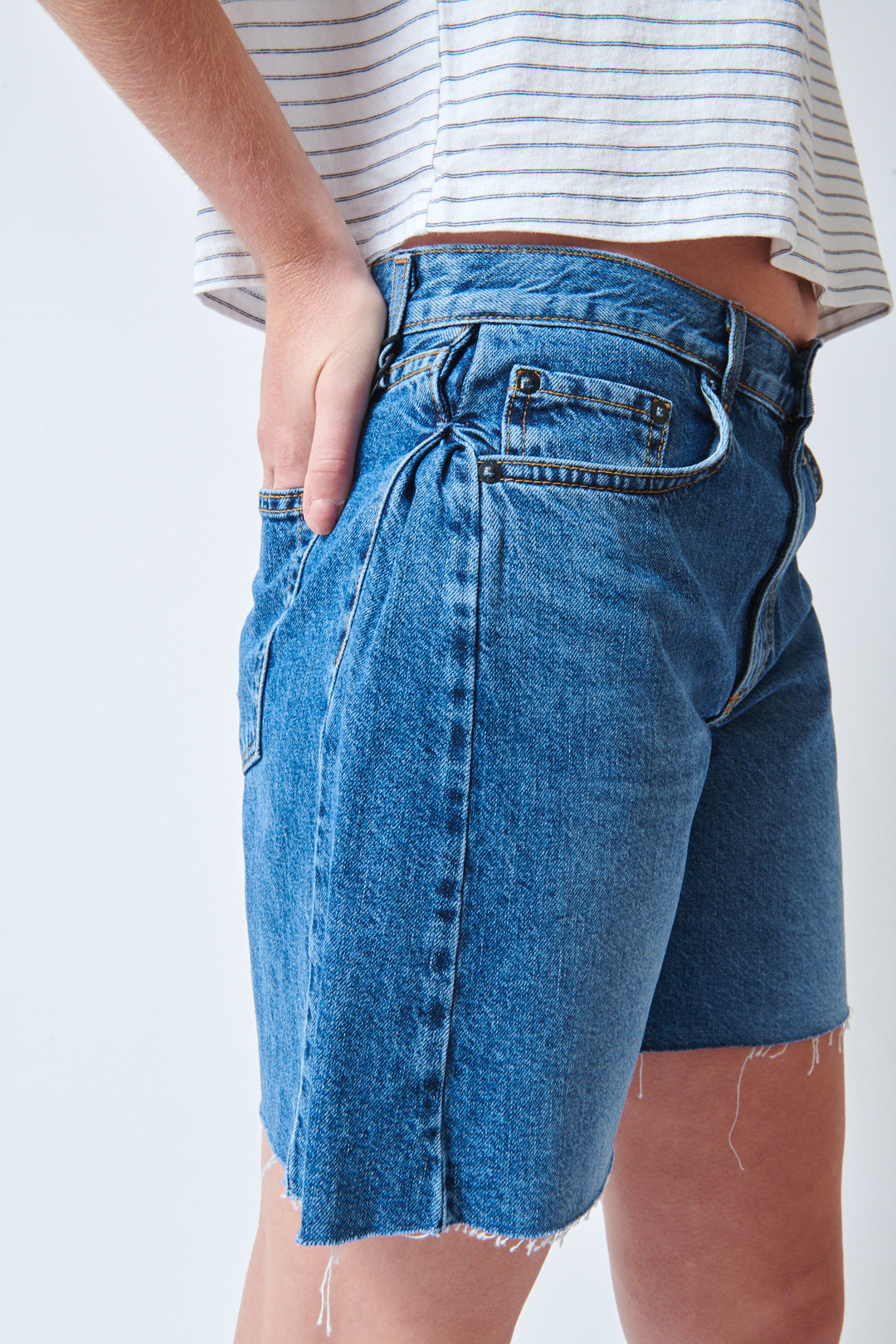 Julia wearing ASKK NY The Sloop Short side detail view