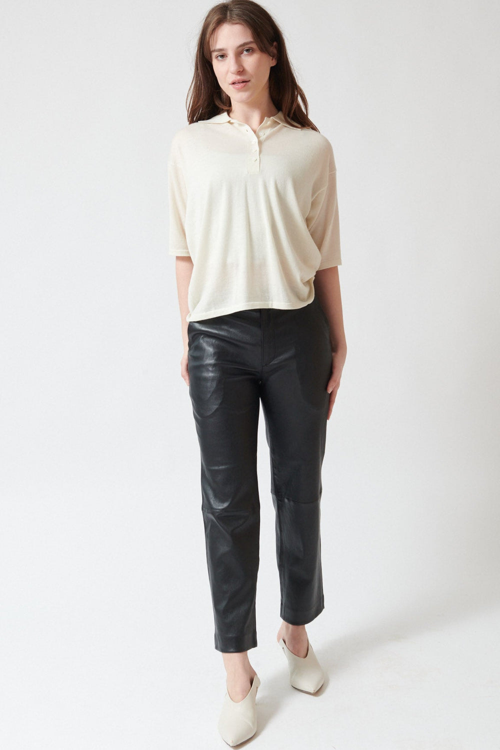 Sophie wearing SPRWMN Cropped Baggy Trousers front view