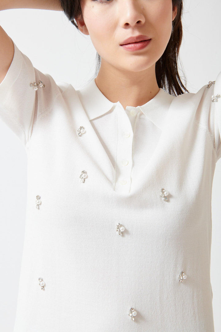 Lilly wearing Seventy Emblazoned Knit Polo front view
