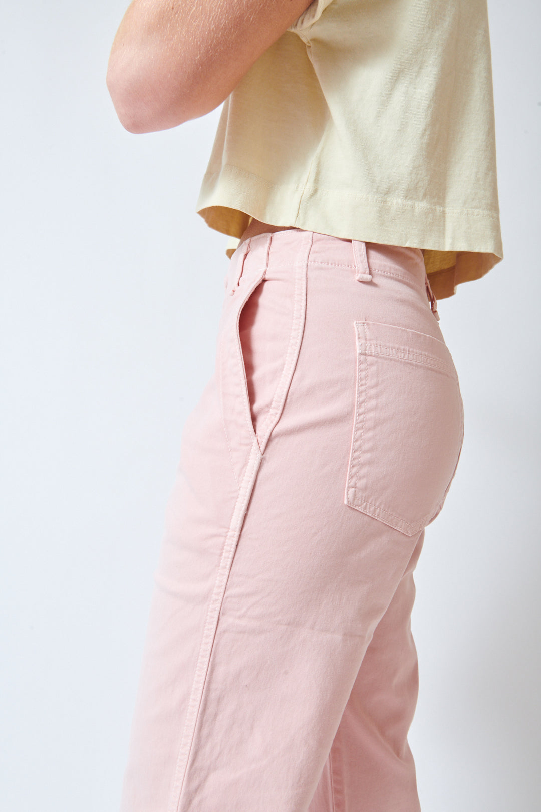 Julia wearing ASKK NY Tomboy sanded pink side/pocket view
