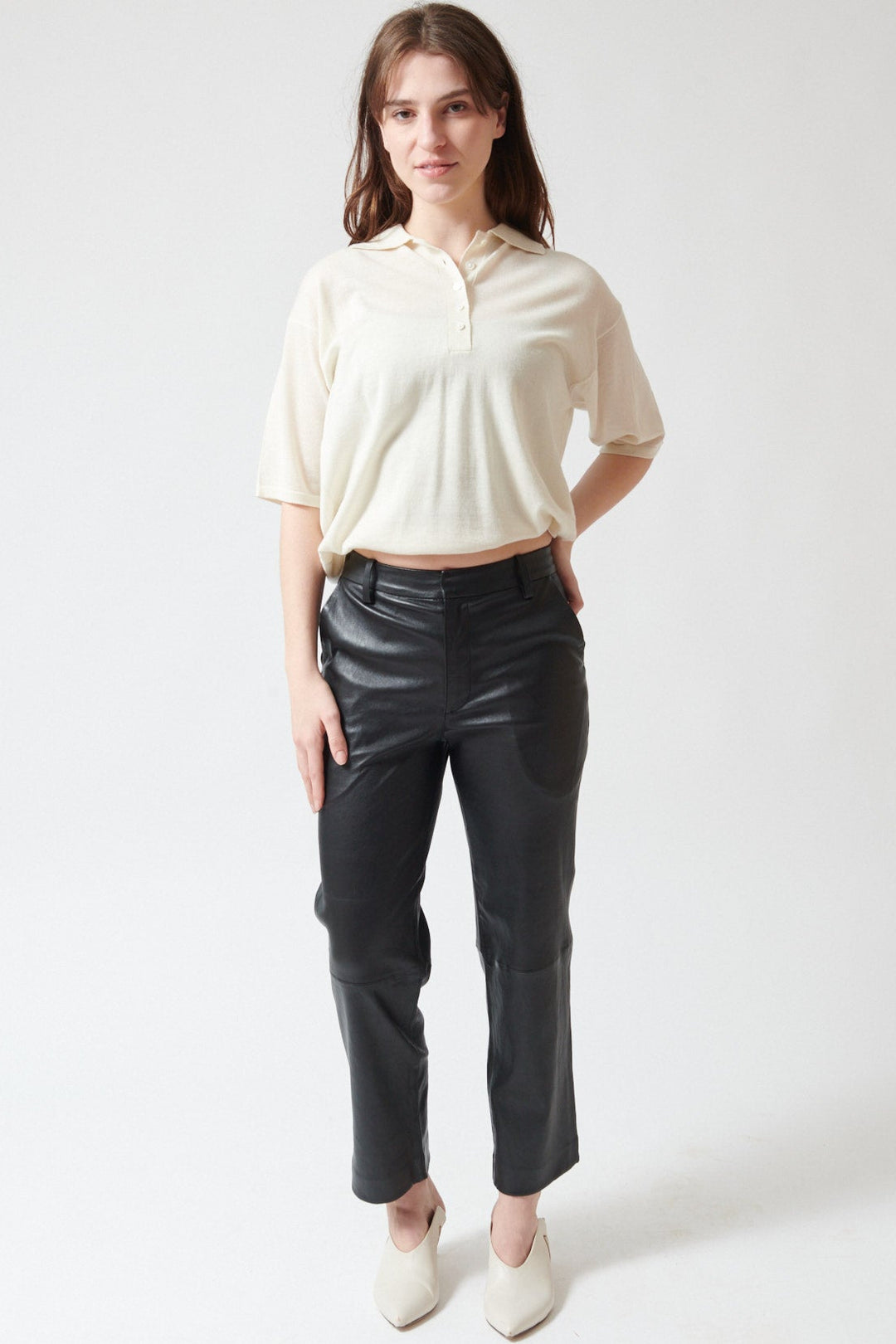 Sophie wearing SPRWMN Cropped Baggy Trousers front view