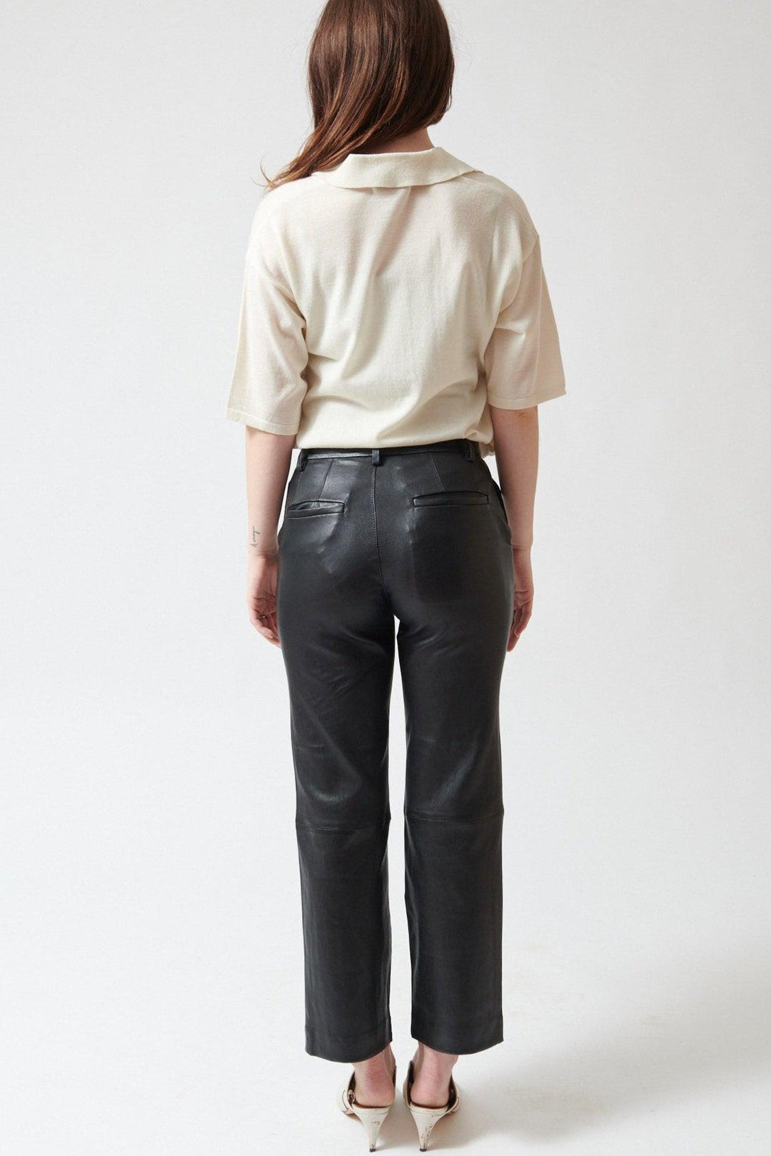 Sophie wearing SPRWMN Cropped Baggy Trousers rear view