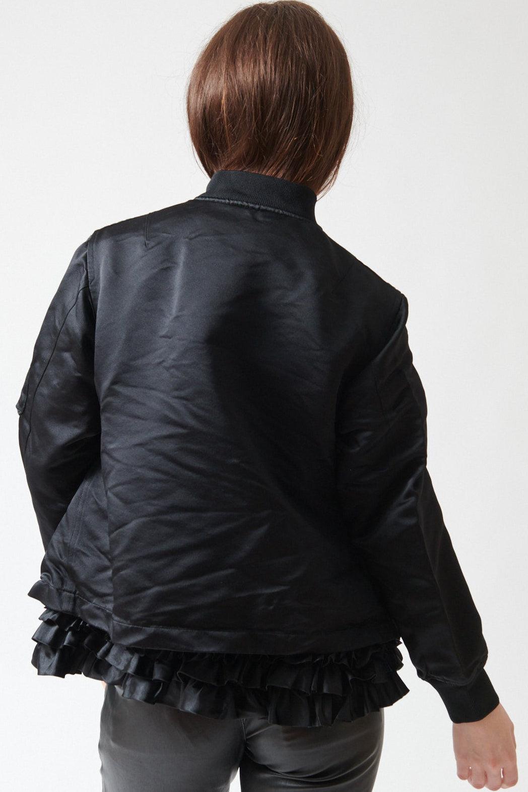 Sophie wearing Comme des Garçons Furbelow Jacket rear view