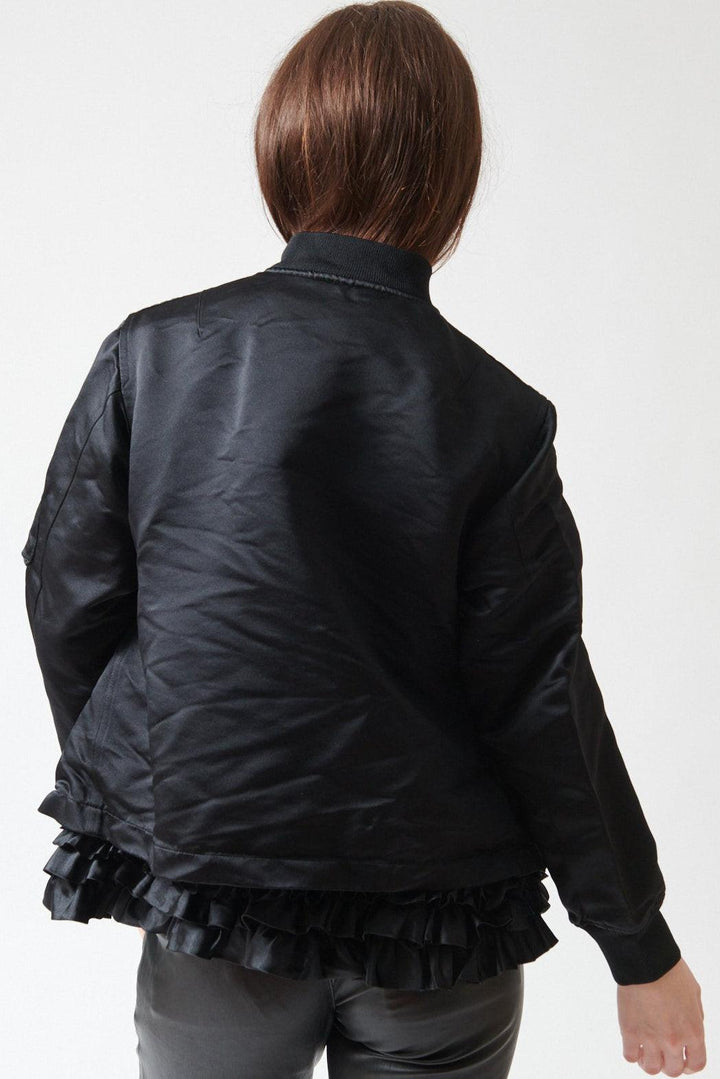 Sophie wearing Comme des Garçons Furbelow Jacket rear view