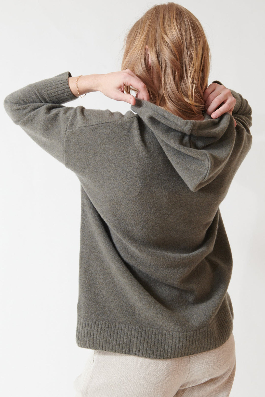 Madi wearing Evam Eva Press Wool Parka rear view