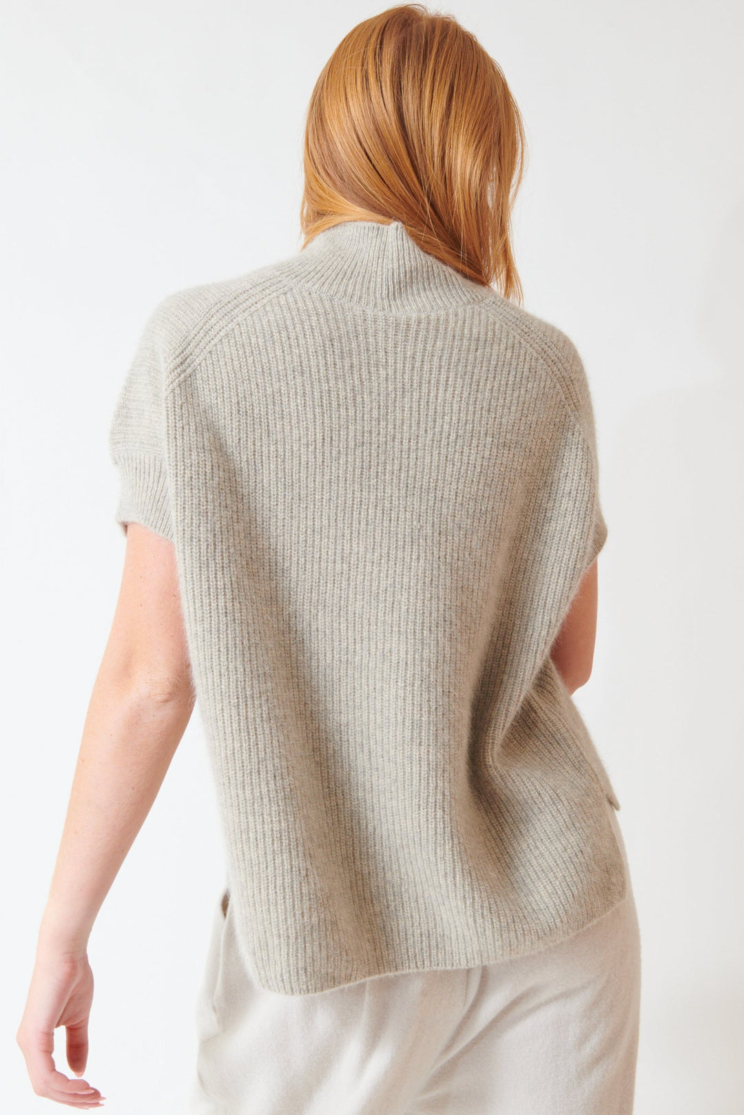 Aysia wearing Evam Eva Wool Fox Aze Vest rear view