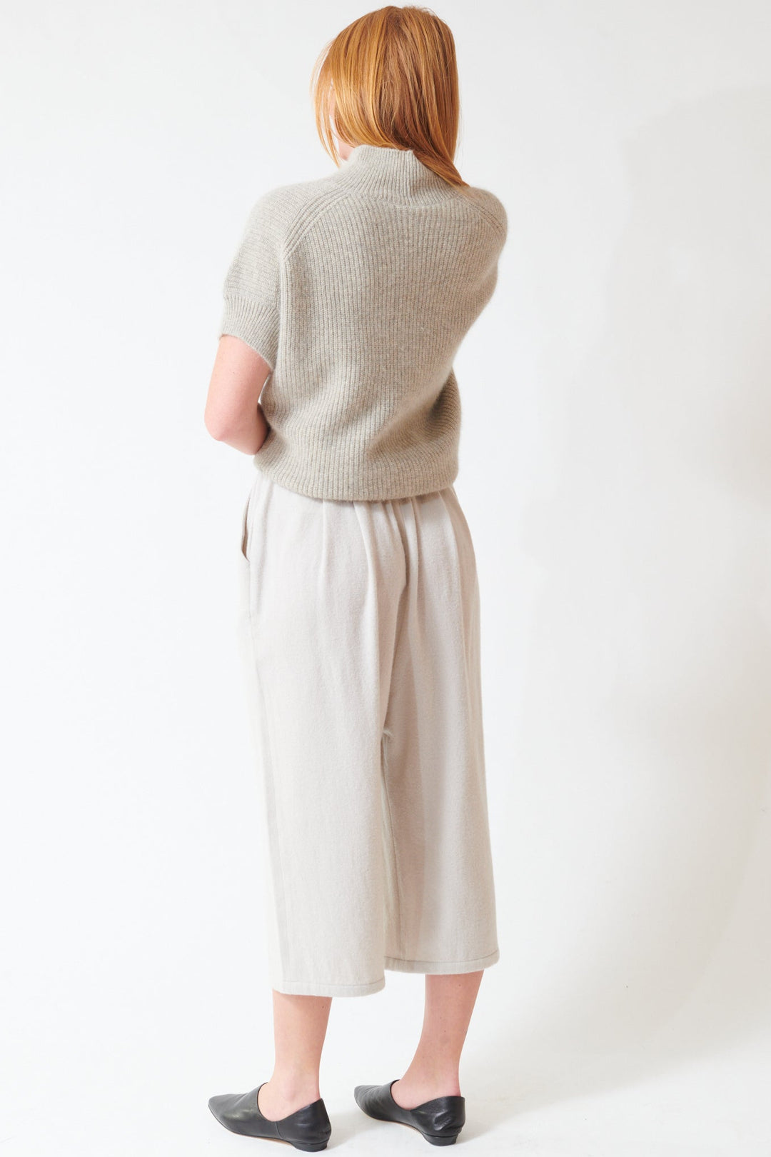 Aysia wearing Evam Eva Tuck Pants rear view