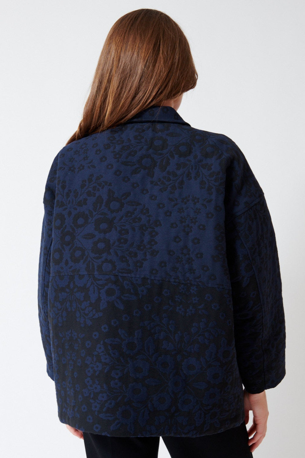 Julia wearing Fabiana Pigna Romi French Double Faced Floral Jacquard Jacket Blue Floral in Blue Floral, rear view.