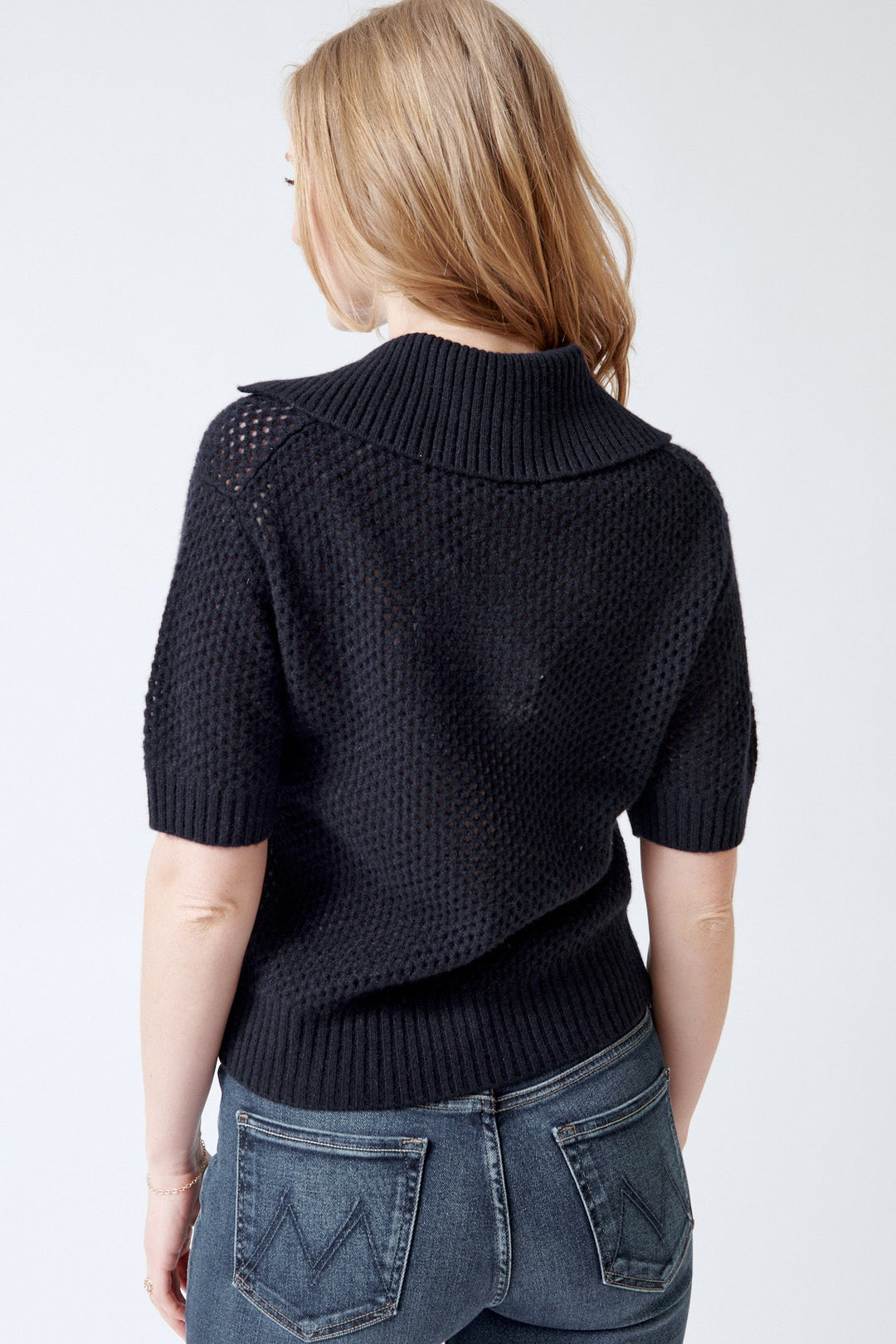 Mari wearing White + Warren Cashmere Mesh Polo rear view