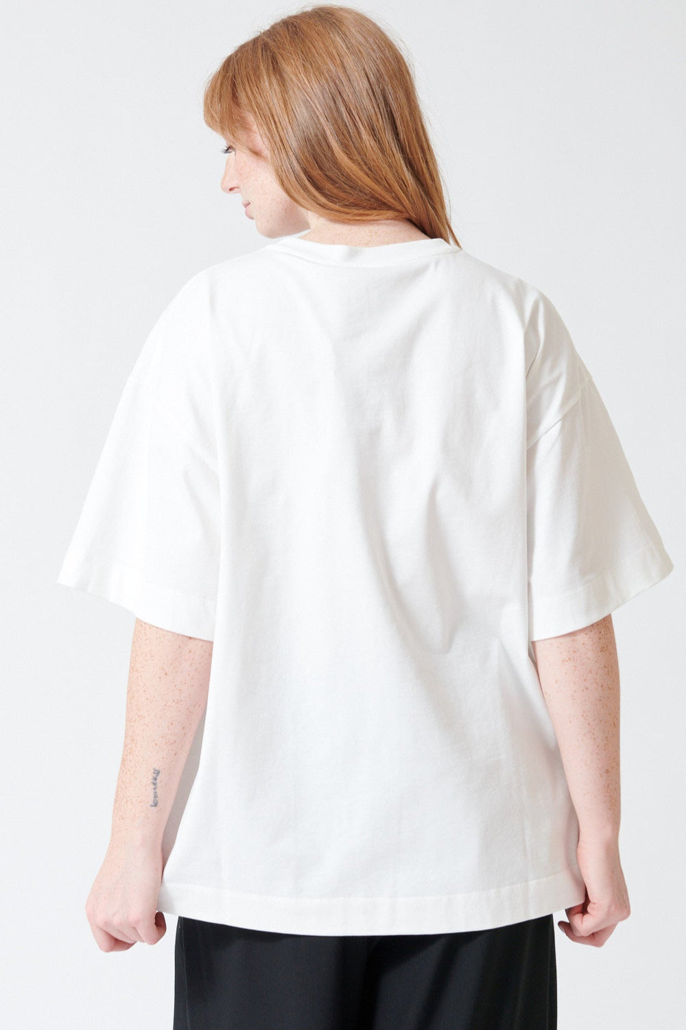 Waverly wearing Meimeij Pearl Bobbles T Shirt rear view