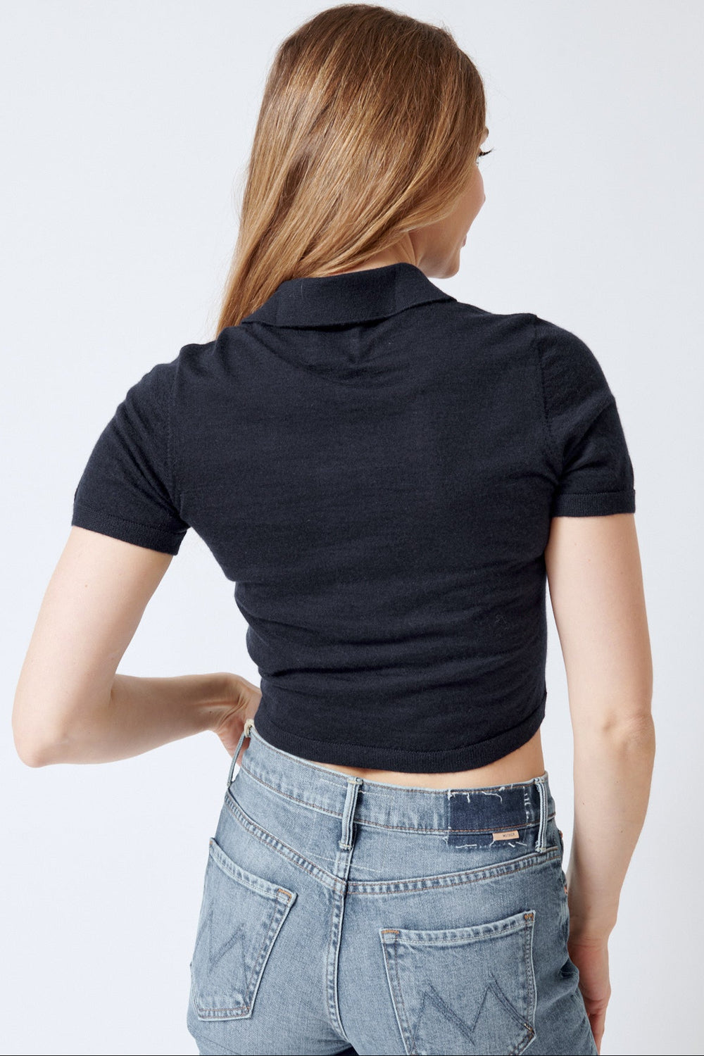 Mari wearing Allude Cashmere Quarter Sleeve Polo Sweater rear view