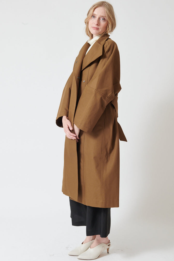 Madi wearing Christian Wijnants Cuwanak Coat side/front view