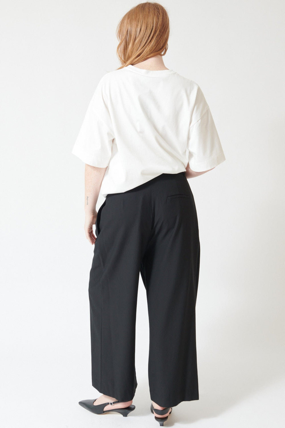 Waverly wearing Meimeij Wide Leg Wrap Trouser rear view