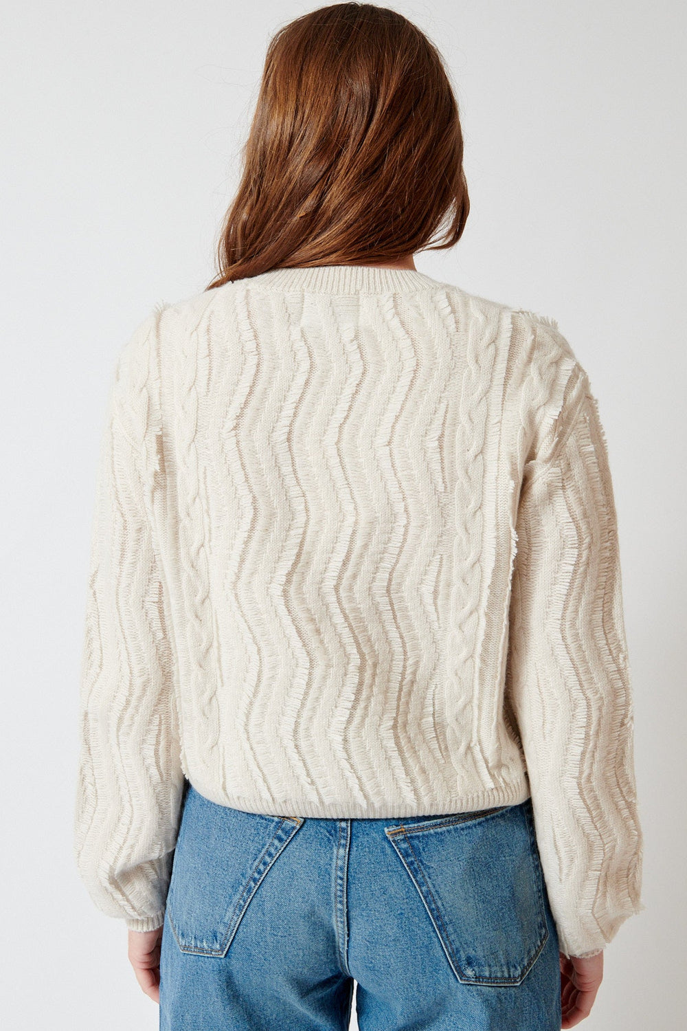 Julia wearing Jumper 1234 Raw Cut Cable Crew rear view