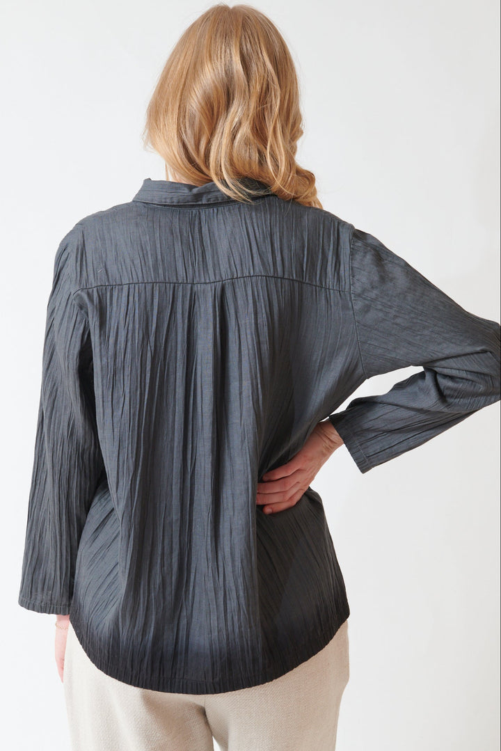 Madi wearing Evam Eva Linen Gradation Shirt rear view