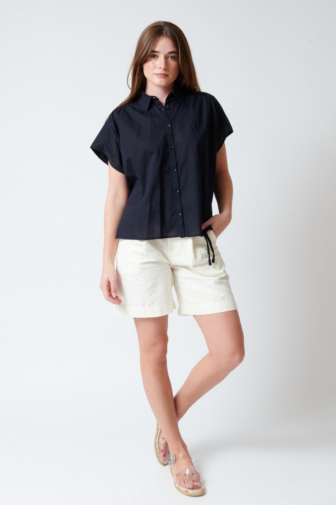 Julia wearing Apiece Apart Bari Midi Short front view