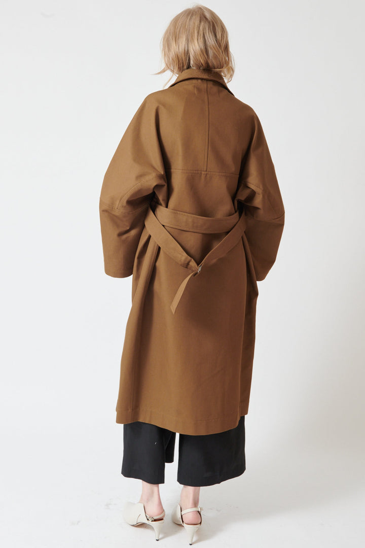 Madi wearing Christian Wijnants Cuwanak Coat rear view