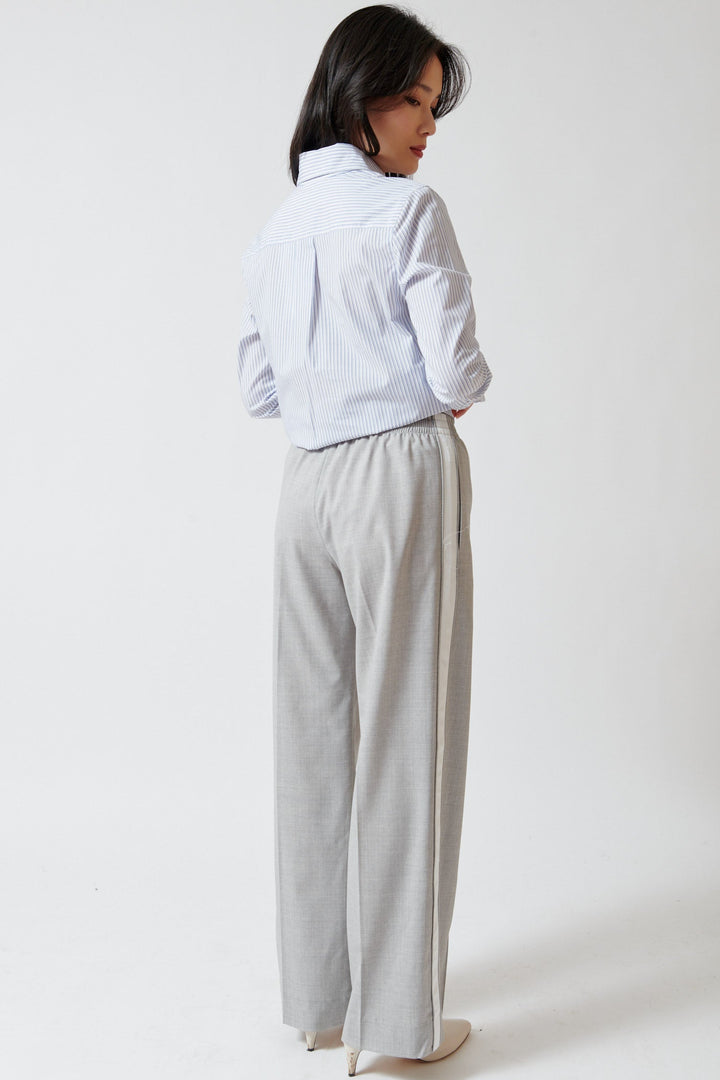 Lilly wearing WE-AR4 The Chaplin Trouser rear view