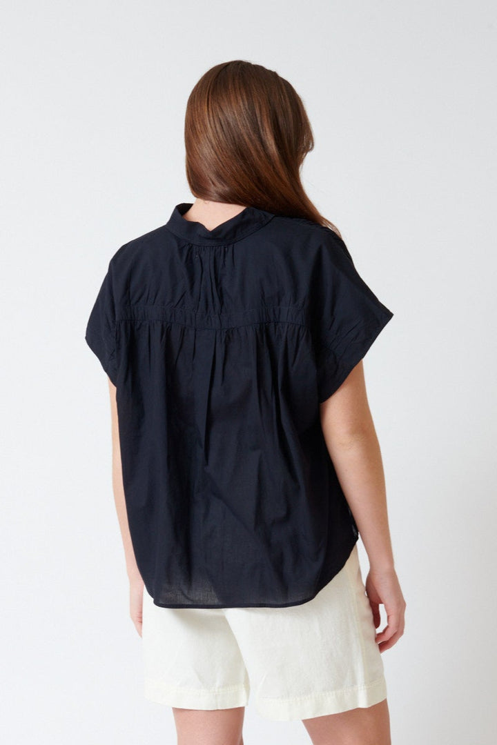 Julia wearing Apiece Apart Agni Floaty Top rear view
