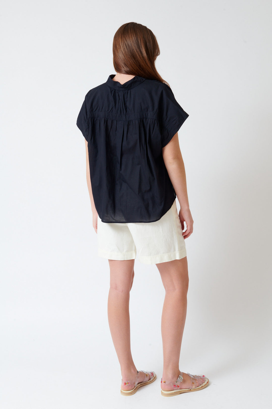 Julia wearing Apiece Apart Bari Midi Short rear view