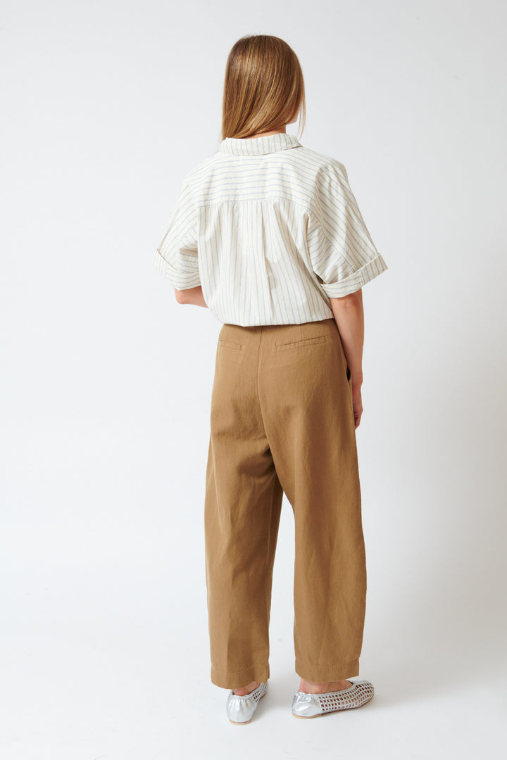 Mari wearing Apiece Apart Bari Crop Trouser rear view