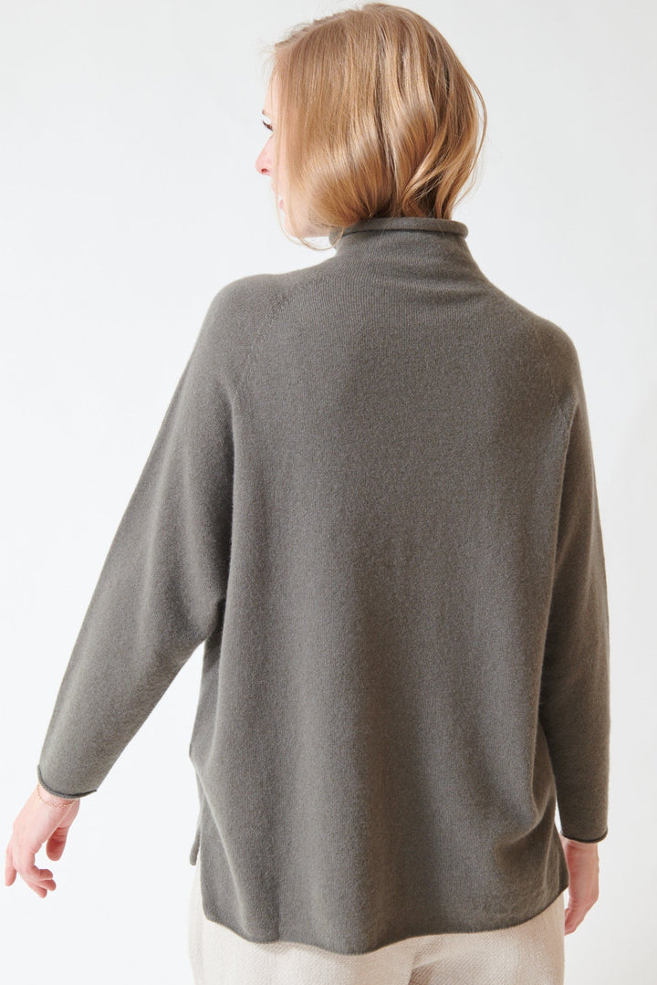 Madi wearing Evam Eva Cashmere EE Turtleneck rear view