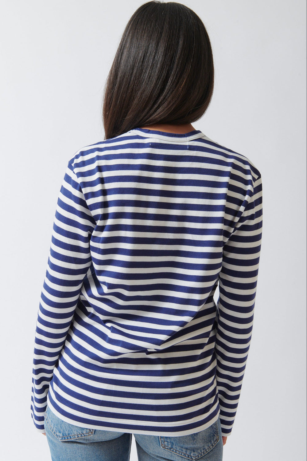 Amanda wearing Comme des Garçons PLAY Red Heart Emblem Striped Long Sleeve Tee Navy White rear view