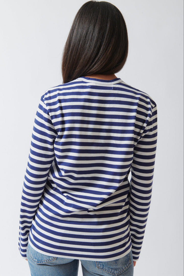 Amanda wearing Comme des Garçons PLAY Red Heart Emblem Striped Long Sleeve Tee Navy White rear view