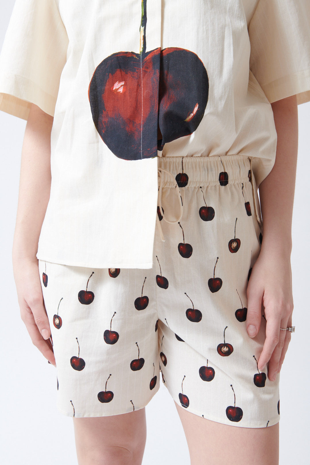 Sophie wearing Stine Goya Crisp Stripe Shirting Elasticated Waistband Shorts front/detail view