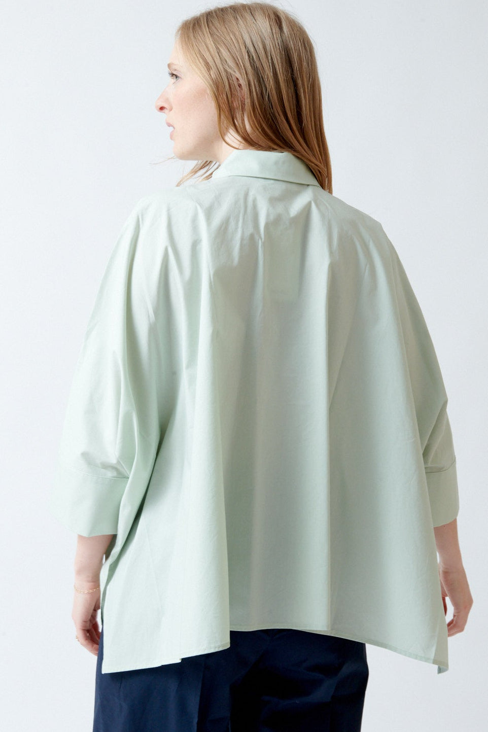 Madi wearing Meimeij Oversized Button Down And Button Sleeve Shirt rear view
