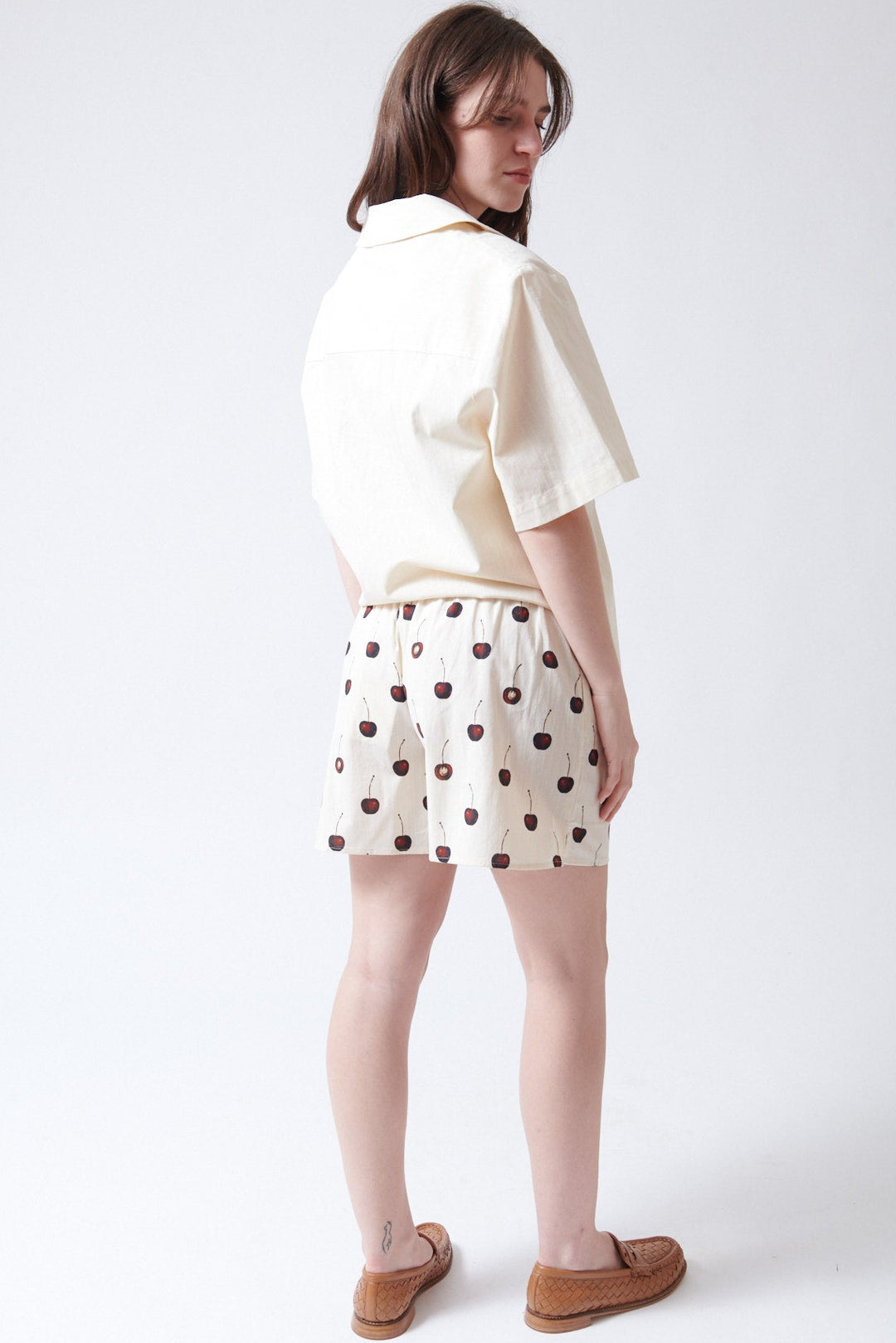 Sophie wearing Stine Goya Crisp Stripe Shirting Elasticated Waistband Shorts rear view