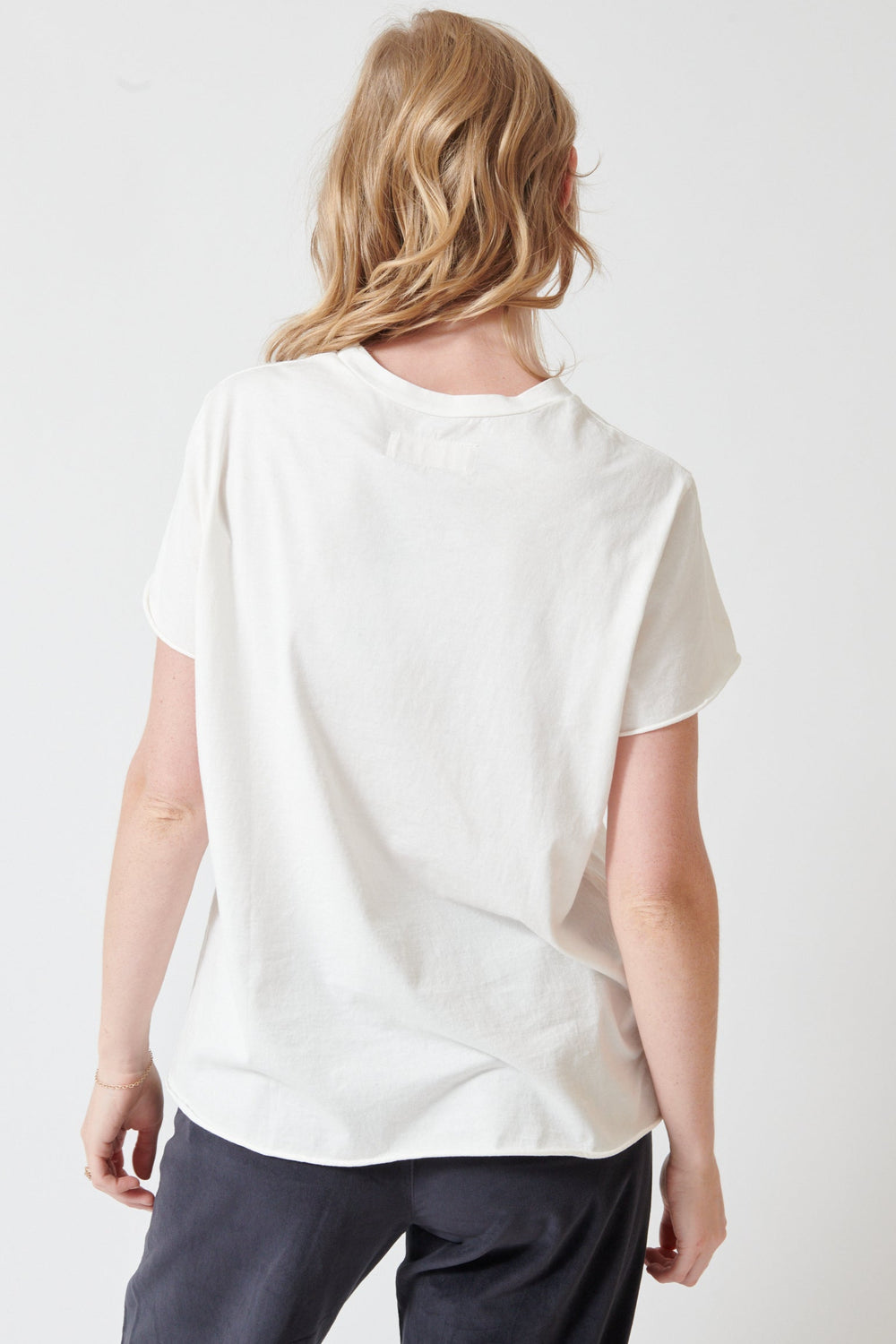 Madi wearing Labo.Art Rico Tee Shirt rear view