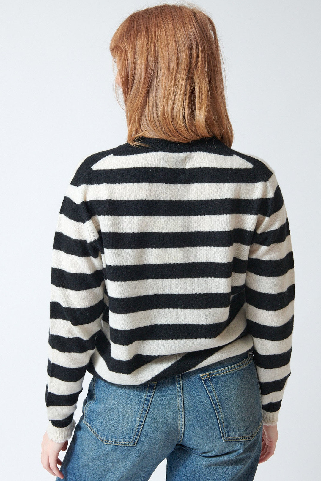 Waverly wearing Jumper 1234 Stripe Distressed Crew rear view