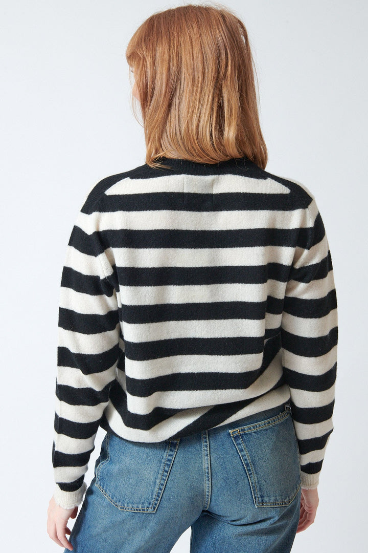 Waverly wearing Jumper 1234 Stripe Distressed Crew rear view