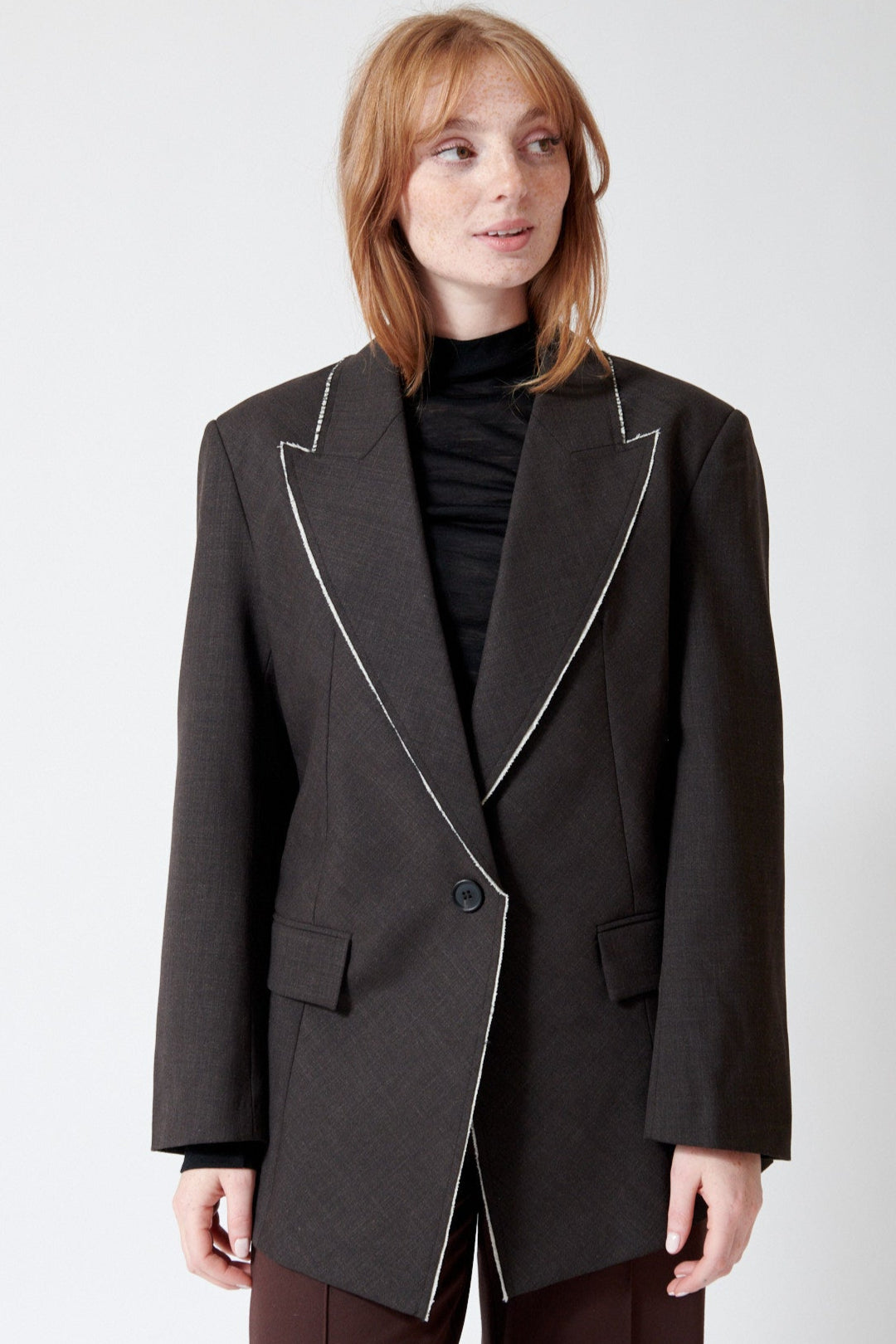 Waverly wearing Meimeij Raw Edge Single Button Blazer front view